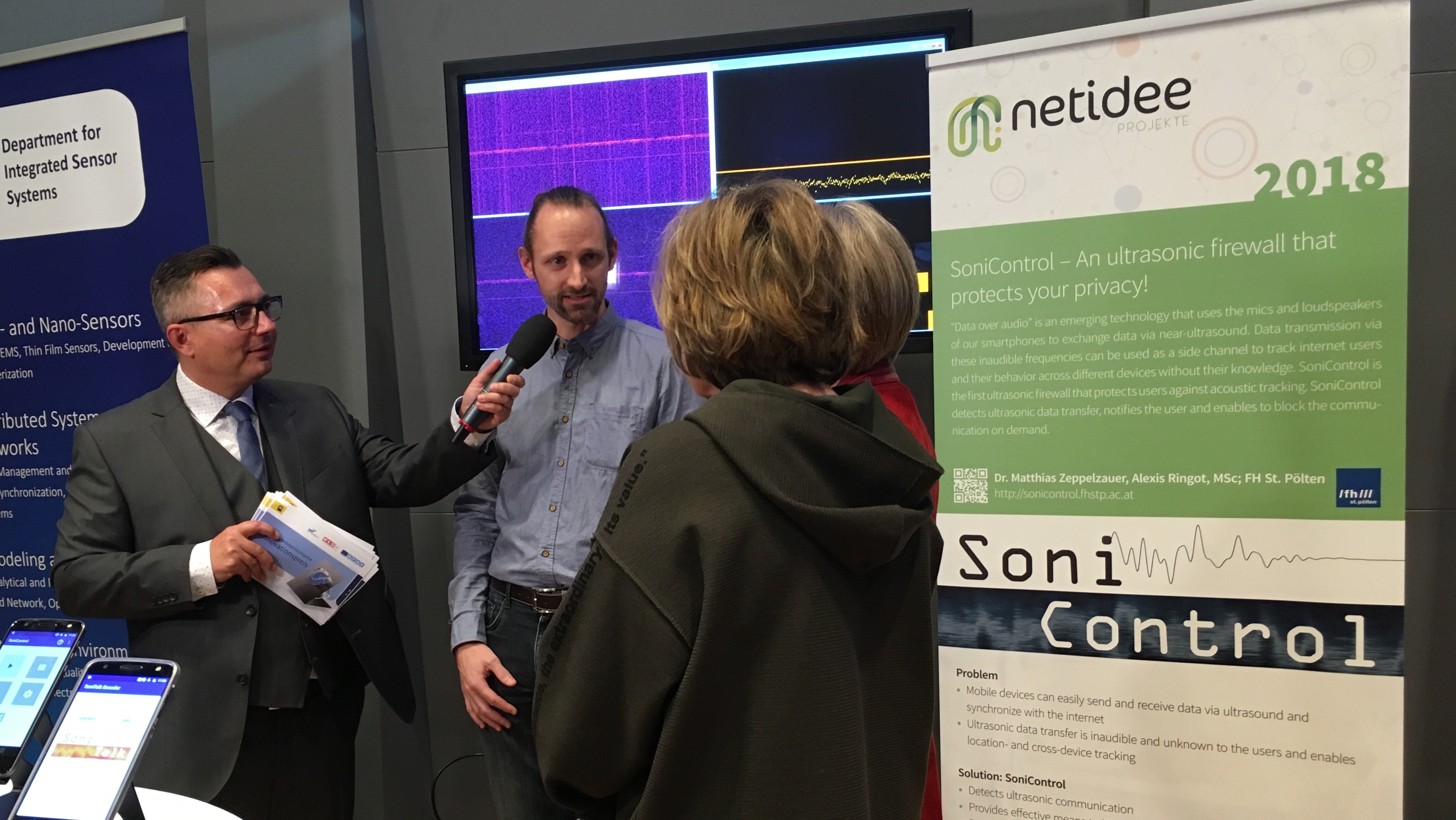 Discussion at SoniControl booth